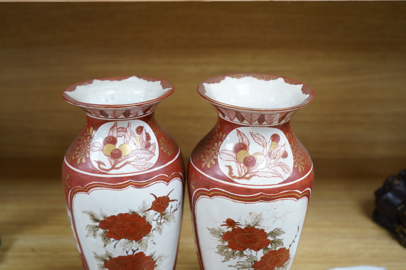 A pair of Japanese Kutani vases, signed, Meiji period (1868-1912), 25cm